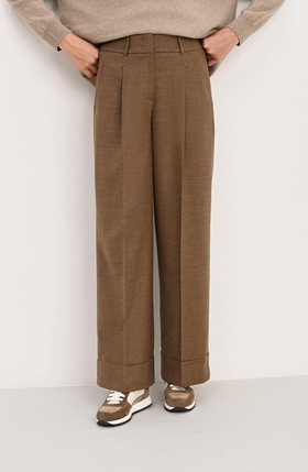 Женские бежевые брюки из шерсти