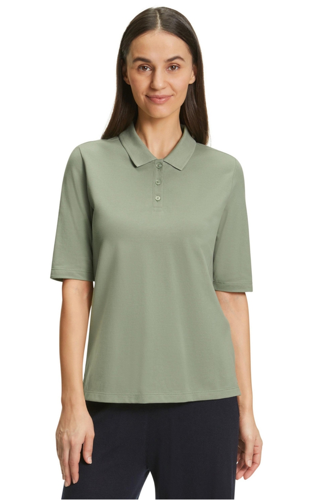 Женская зеленая футболка-поло 1