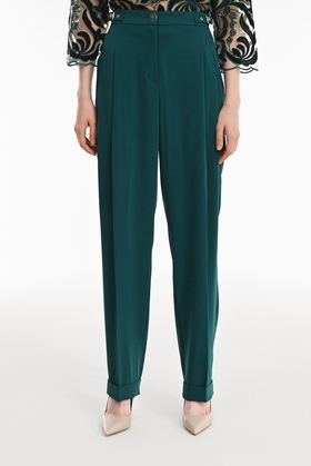 Зеленые женские брюки
