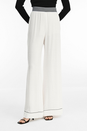 Широкие женские белые брюки